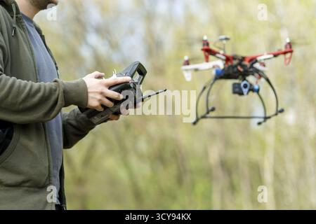 Man controling a drone Stock Photo