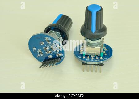 Variable resistor isolated on white background. Electronic parts concept. potentiometer. Stock Photo