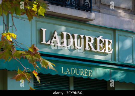 Sign and logo on a Ladurèe boutique. Ladurèe is a French company founded in Paris, France in 1862 specializing in pastries and famous for its macarons Stock Photo