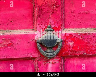 Old red weathered door Stock Photo