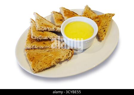 Studio shot of a serving of potted shrimp with toast isolated on white Stock Photo