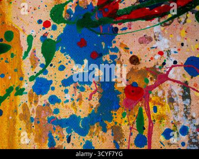 Abstract of vibrant colors splattered across the canvas Stock Photo