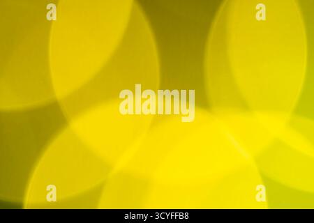 Yellow, white, and orange bokeh – abstract holiday background with defocused Christmas lights Stock Photo