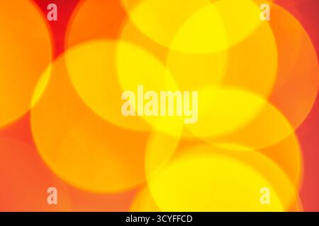 Yellow, white, and orange bokeh – abstract holiday background with defocused Christmas lights Stock Photo