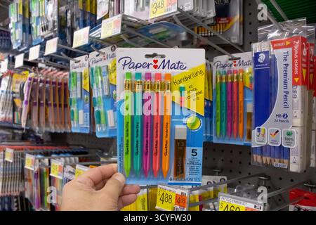 Los Angeles, California, United States - 02-01-2023: A view of a hand holding a package of PaperMate colored mechanical pencils, at the store. Stock Photo