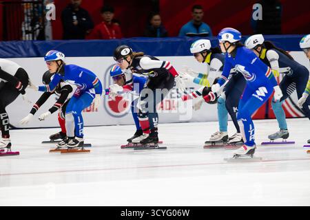 Skaters race during an ISU short track speed skating world tour event ...