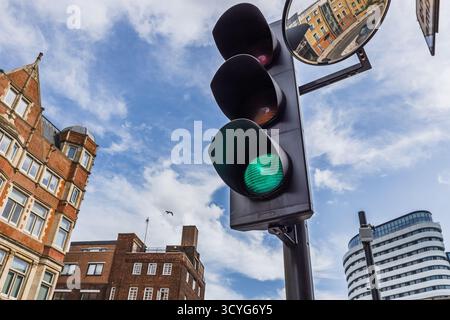 green traffic light at an intersection in Berlin Stock Photo - Alamy