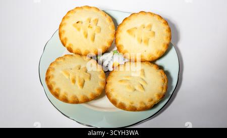 Christmas Mince Pies on a plate for sharing Stock Photo