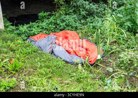 Discarded sleeping bag Stock Photo