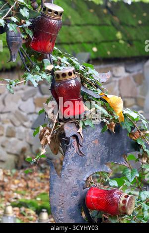 Grave Lights and Ivy on an Old Tombstone Stock Photo