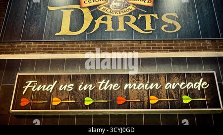 Sign points to Coral Island darts,Blackpool,uk, Stock Photo