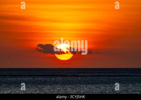 Colorful sunset over the Sunda Sea. Flores, Indonesia. Stock Photo