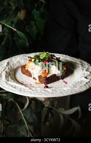 delicious gourmet brunch, creamy burrata on toasted sourdough, elegant dish with burrata Stock Photo