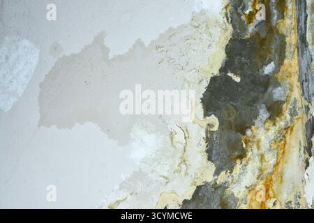 Corroded wall surface with rust and peeling paint. Stock Photo