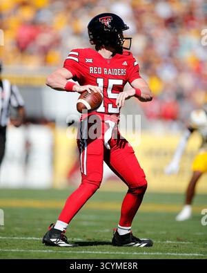 Texas Tech quarterback Will Hammond, center, throws the ball during the
