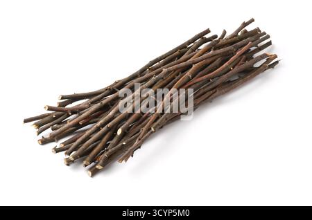 Pile of dry wooden twigs isolated on white Stock Photo