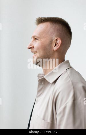 Smiling Man in Profile Stock Photo