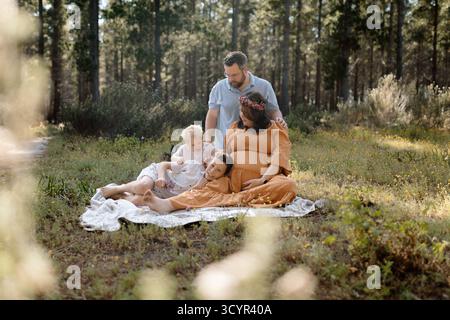 Family Maternity Photos in a Forest Stock Photo
