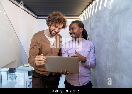 Busy business people, programmers software developer engineer working on computer in office Stock Photo