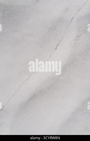 Elegant marble texture featuring soft gray tones and subtle veins, creating a sophisticated backdrop for design projects, providing ample copy space f Stock Photo