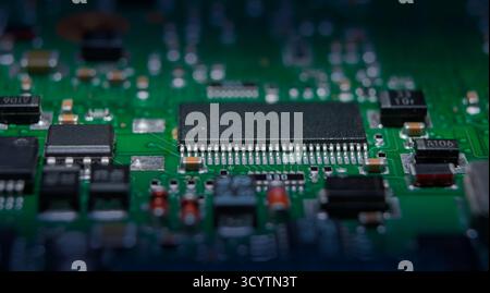 Close-up view reveals intricate details of a microchip, showcasing its role in advancing technology for artificial intelligence and cryptocurrencies. Stock Photo