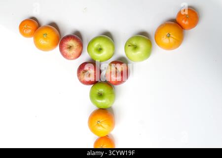 Apples and Oranges on white background. image Stock Photo