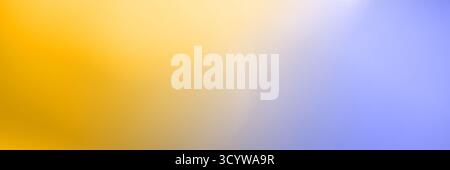 Abstract blur background with gradient shades of yellow and blue creating a soft transition effect. Stock Photo