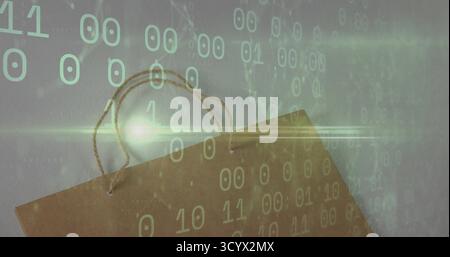 Displaying brown kraft paper bag leaning against grey wall with green binary overlay Stock Photo