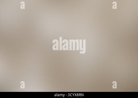 Abstract close-up of white paint splattered on a textured stone surface Stock Photo