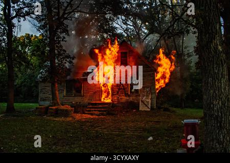 Controlled Structure Fire Training in Lake Lillian Minnesota. Donated house to train fire department on fire behavior. Stock Photo
