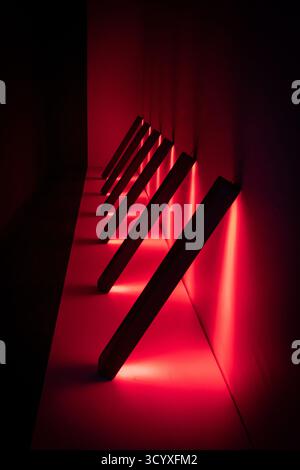 Creative red lighting in the form of a corridor. Stock Photo