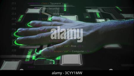 Placing left hand on glowing touchscreen panel at dark workspace, with green icons and code overlay Stock Photo
