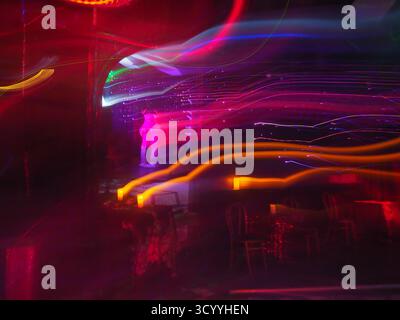 Light trails and neon colors inside House of Yes nightclub in Williamsburg, Brooklyn, New York, capturing abstract motion and vivid nightlife vibes Stock Photo