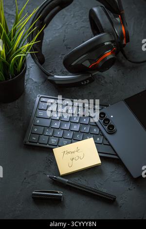 Office desk table with laptop computer, cup of coffee and supplies. Stock Photo