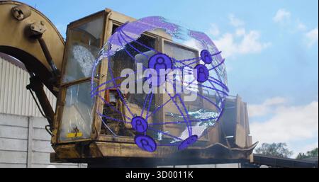 Floating holographic globe hovering in industrial yard, with excavator cabin on raised platform Stock Photo