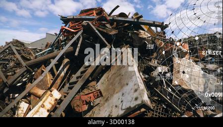 Displaying rusted scrap heap piling in outdoor scrapyard with globe overlay and numeric data points Stock Photo