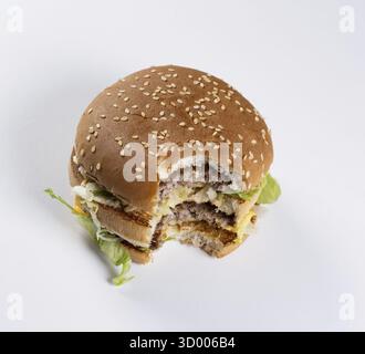 Large double hamburger on white background to cut big double hamburger on white background prepared for cropping Stock Photo