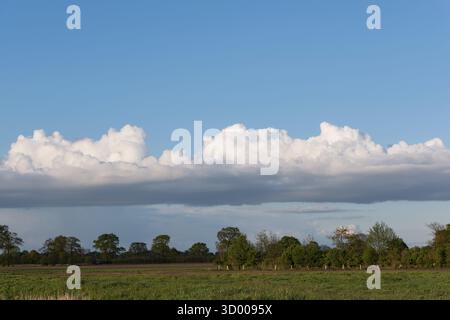 Big rain clouds gather in the sky Big rain clouds gather in the sky Stock Photo