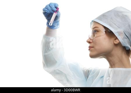 Doctor in protective glasses with test tube in hands on blank white background Stock Photo