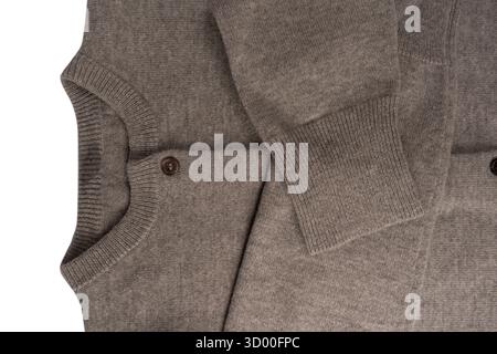 Grey cardigan texture as a background. Knitted pattern. Top view. Stock Photo