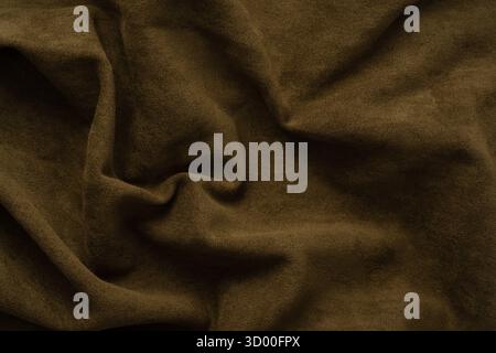 Green fabric texture as a background. Top view. Stock Photo