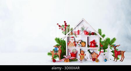 Christmas Miniature House with Festive Decorations Stock Photo