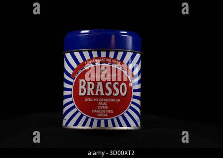EXETER, DEVON, UK - July 15, 2025 single can of Brasso metal polish isolated product on a black background Stock Photo
