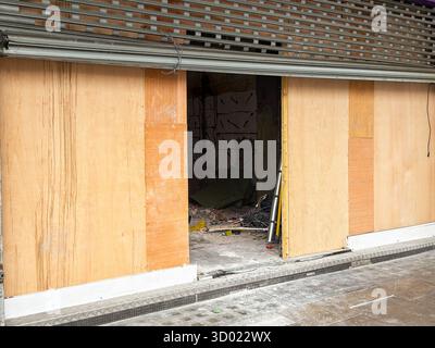 Front view of an empty shop being refurbished. No people. Stock Photo