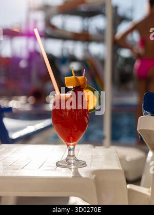 A relaxing pool area with vibrant colors conveys a tropical vacation ...