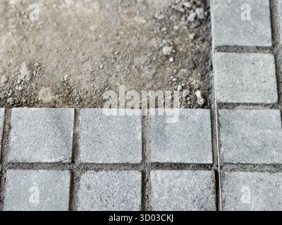 Close-Up View of Andesite Stone Pavement Installation Stock Photo