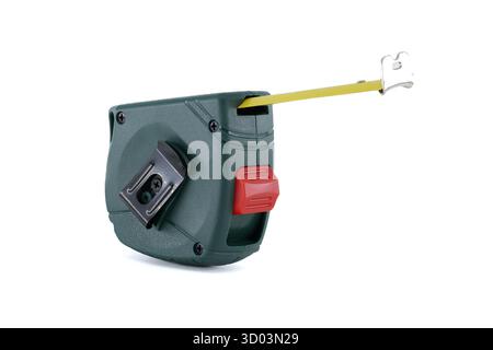 A close-up shot of a green and red tape measure, with the yellow tape extended against a white background, perfect for construction or DIY themes. Stock Photo
