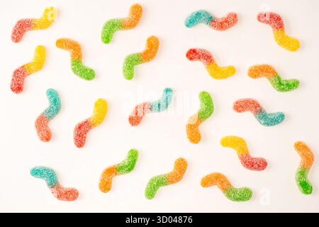 Juicy colorful jelly sweets isolated on a white background. Gummy candies. Snakes. Stock Photo