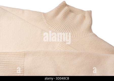 Soft milky color merino wool sweater isolated on a white background. Top view. Stock Photo