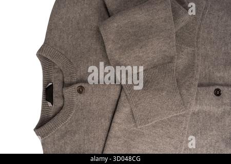 Grey cardigan texture as a background. Knitted pattern. Top view. Stock Photo